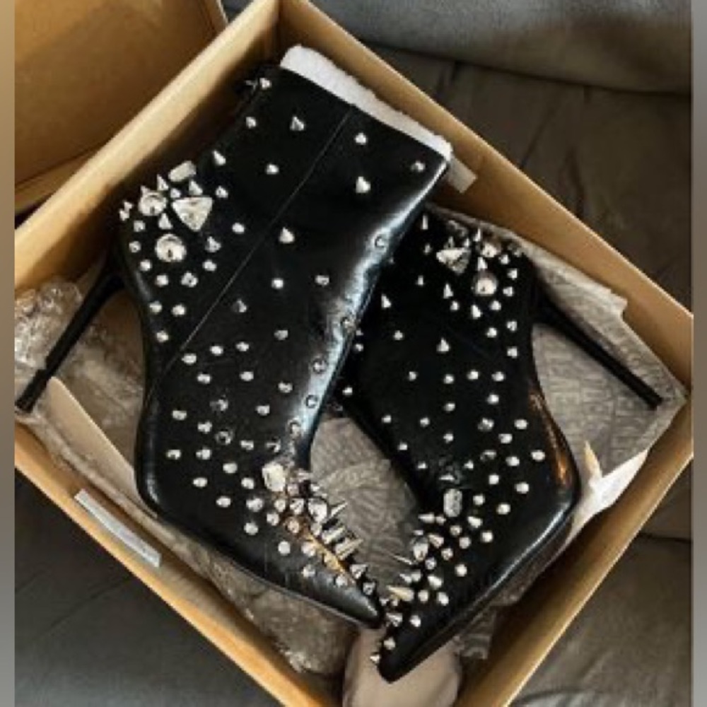 Studded Steve Madden stiletto boots.